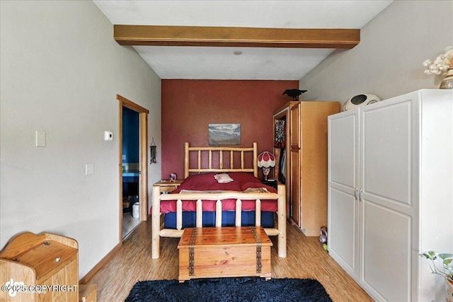 4510 Thomas Ct, Homer, AK 99603 - bedroom featuring beam ceiling and light wood-style flooring
