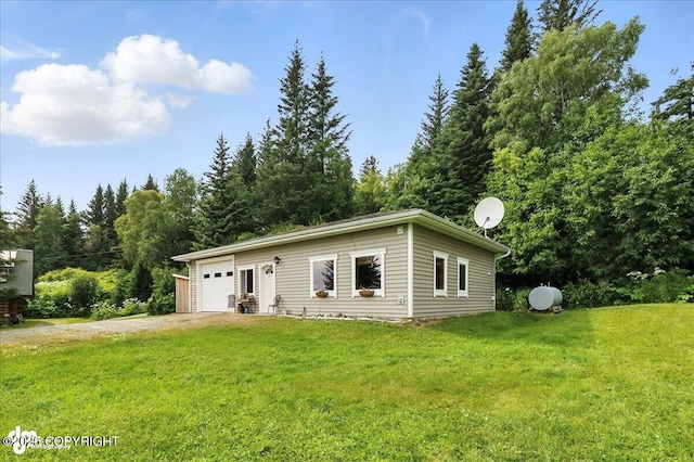 4510 Thomas Ct, Homer, AK 99603 - view of front facade featuring a garage, a front lawn, and driveway