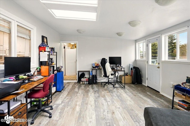 home office with light wood-type flooring