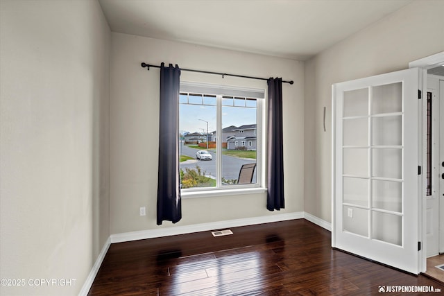 4187 Chiniak Bay Dr, Anchorage, AK 99515 - spare room with dark wood-style floors and baseboards