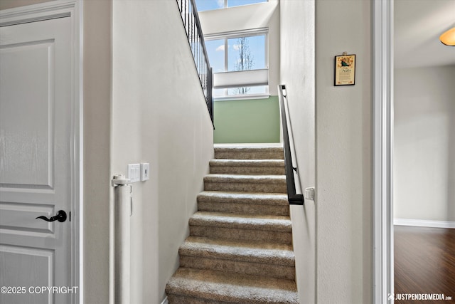 4187 Chiniak Bay Dr, Anchorage, AK 99515 - stairway featuring baseboards and wood finished floors