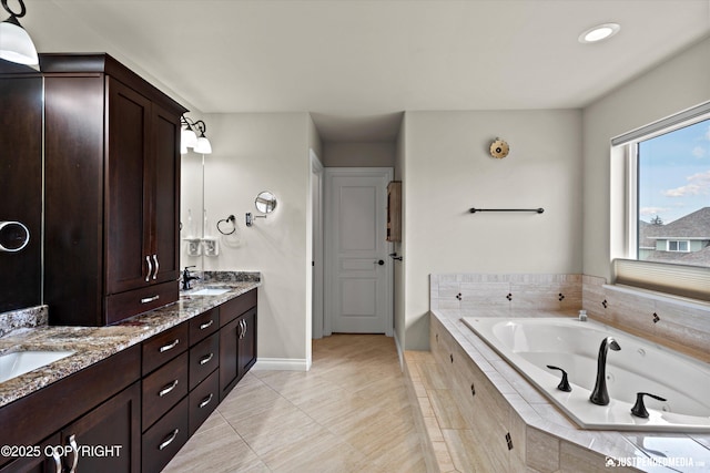 4187 Chiniak Bay Dr, Anchorage, AK 99515 - bathroom featuring double vanity, baseboards, a whirlpool tub, tile patterned floors, and recessed lighting