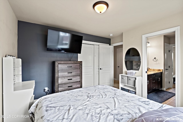 4187 Chiniak Bay Dr, Anchorage, AK 99515 - bedroom featuring a closet and ensuite bath