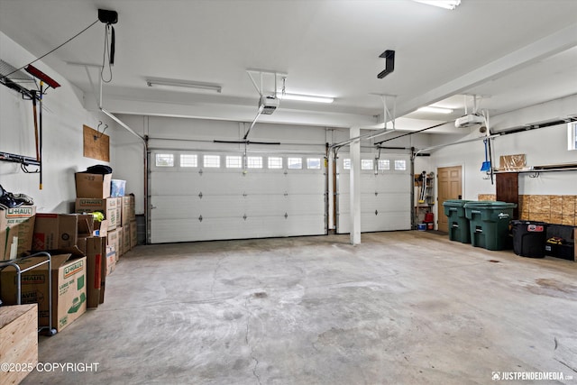 4187 Chiniak Bay Dr, Anchorage, AK 99515 - garage featuring a garage door opener