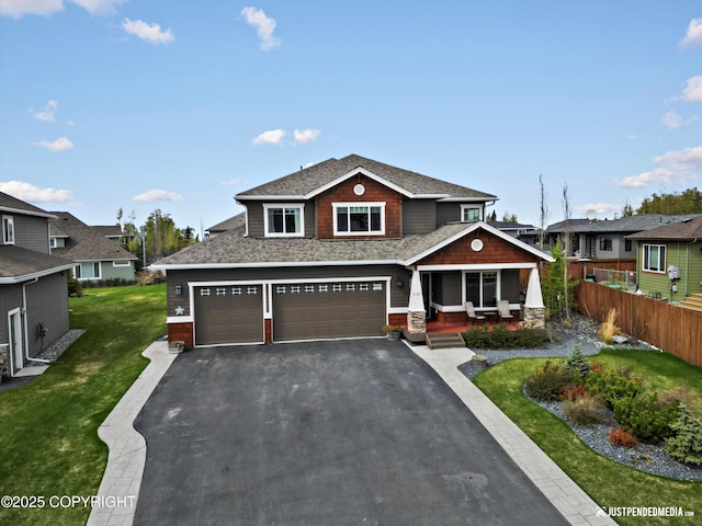 4187 Chiniak Bay Dr, Anchorage, AK 99515 - craftsman inspired home featuring a porch, an attached garage, driveway, and roof with shingles
