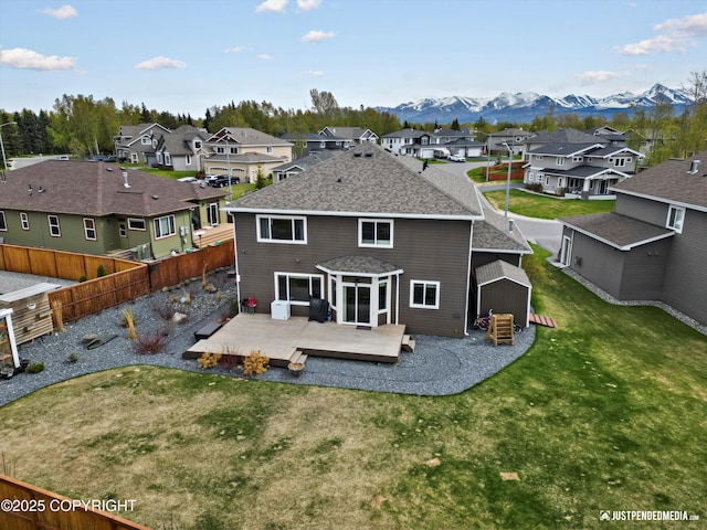4187 Chiniak Bay Dr, Anchorage, AK 99515 - back of house with a residential view, a deck with mountain view, and roof with shingles