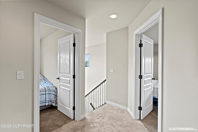 4187 Chiniak Bay Dr, Anchorage, AK 99515 - hallway with carpet floors, an upstairs landing, and baseboards