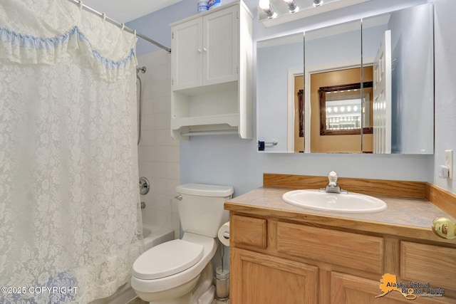 9500 Aphrodite Dr, Anchorage, AK 99515 - bathroom with toilet, shower / bath combo with shower curtain, and vanity