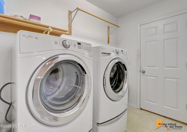 9500 Aphrodite Dr, Anchorage, AK 99515 - clothes washing area featuring washing machine and clothes dryer