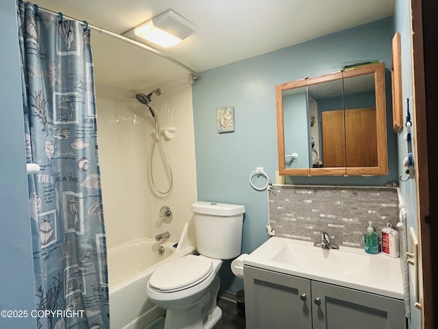 full bathroom with tasteful backsplash, toilet, shower / bath combination with curtain, and vanity