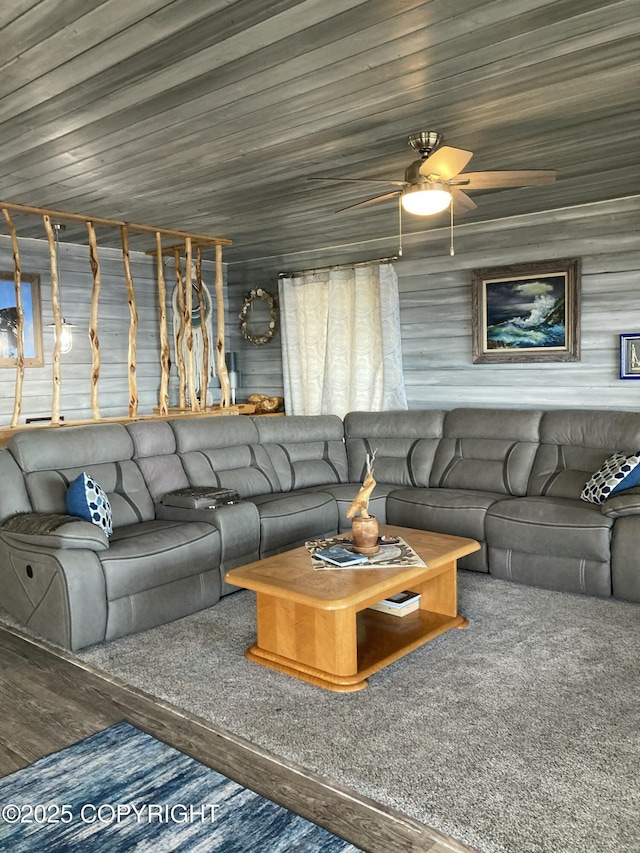 living area featuring a ceiling fan