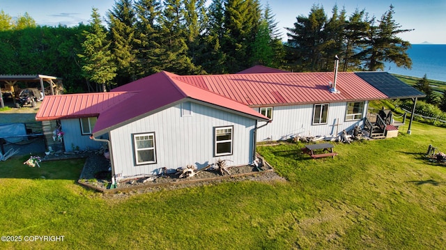 26957 Sterling Hwy, Anchor Point, AK 99556 - rear view of property featuring a metal roof and a lawn