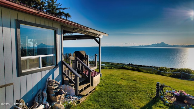 26957 Sterling Hwy, Anchor Point, AK 99556 - view of grassy yard featuring a water view and boat lift