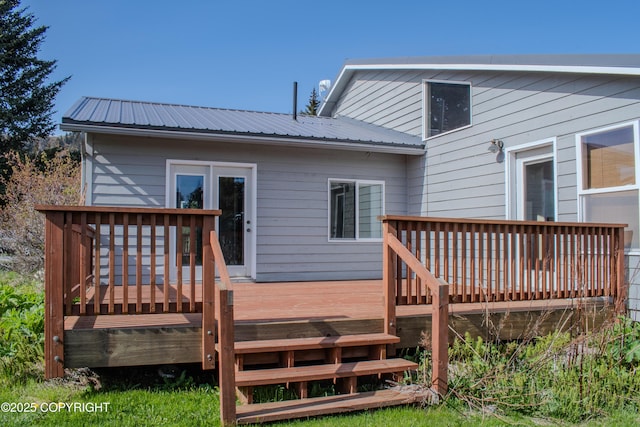 255 Lee Dr, Homer, AK 99603 - rear view of house featuring metal roof and a deck