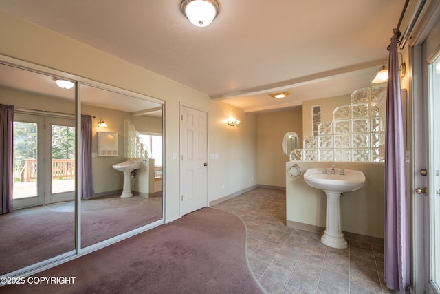 255 Lee Dr, Homer, AK 99603 - bathroom featuring baseboards and a sink