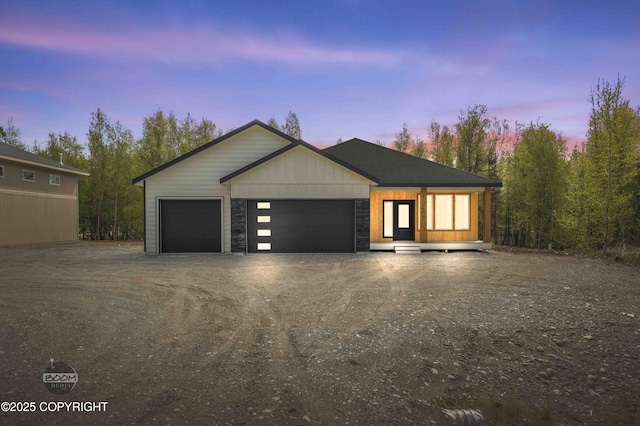 7254 E Riparian Loop, Palmer, AK 99645 - view of front facade featuring a garage and driveway