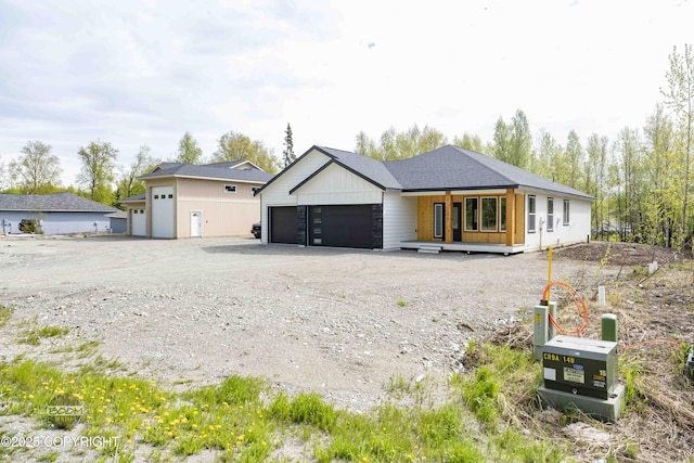 7254 E Riparian Loop, Palmer, AK 99645 - view of front facade with a garage and driveway