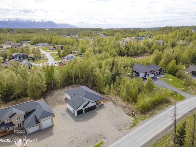 7254 E Riparian Loop, Palmer, AK 99645 - aerial perspective of suburban area featuring mountains and a heavily wooded area