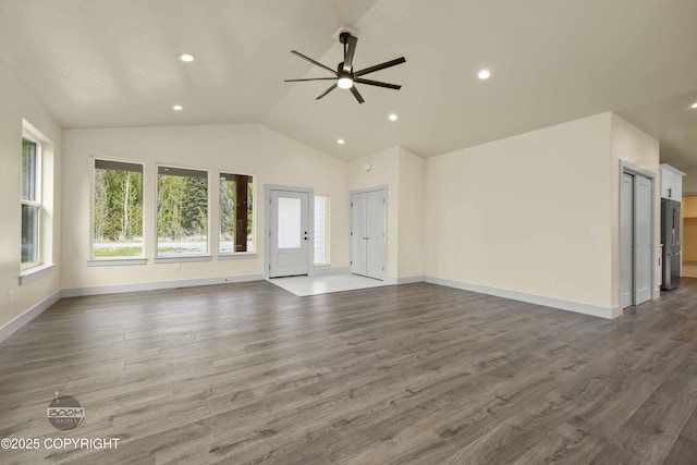 7254 E Riparian Loop, Palmer, AK 99645 - unfurnished living room with a ceiling fan, vaulted ceiling, wood finished floors, recessed lighting, and baseboards