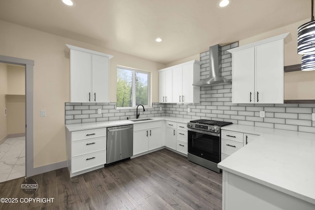 7254 E Riparian Loop, Palmer, AK 99645 - kitchen with stainless steel appliances, wall chimney exhaust hood, a sink, open shelves, and baseboards