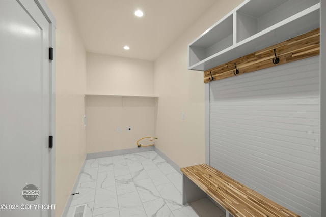 7254 E Riparian Loop, Palmer, AK 99645 - laundry area with light marble finish flooring, recessed lighting, and baseboards