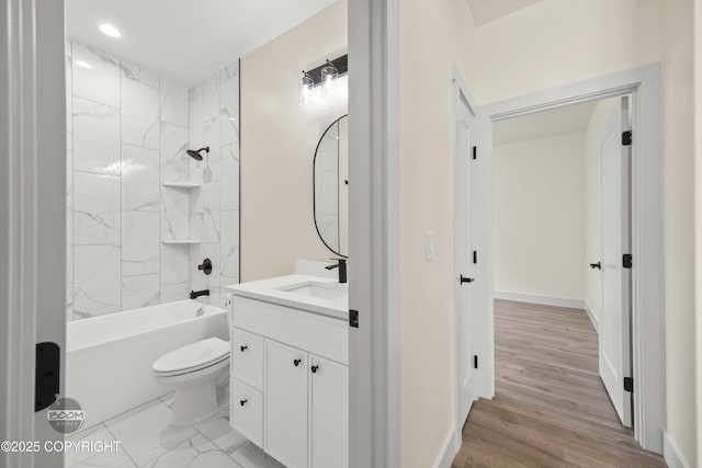 7254 E Riparian Loop, Palmer, AK 99645 - bathroom featuring vanity, toilet, bathtub / shower combination, baseboards, and wood finished floors