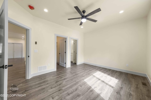7254 E Riparian Loop, Palmer, AK 99645 - unfurnished bedroom with wood finished floors, baseboards, recessed lighting, and a ceiling fan