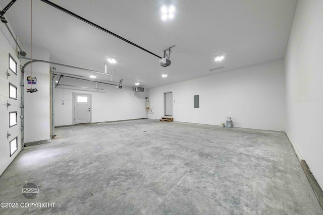 7254 E Riparian Loop, Palmer, AK 99645 - garage featuring a garage door opener and electric panel