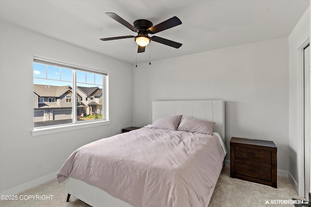7863 Gate Creek Dr, Anchorage, AK 99502 - bedroom featuring carpet flooring, baseboards, and ceiling fan