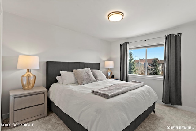 7863 Gate Creek Dr, Anchorage, AK 99502 - bedroom with light colored carpet and baseboards