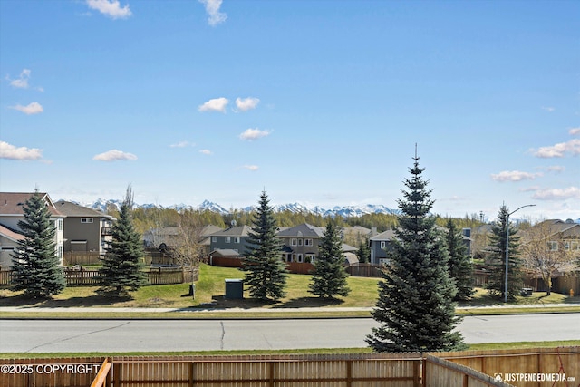 7863 Gate Creek Dr, Anchorage, AK 99502 - view of asphalt street with a residential view and curbs