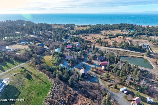 aerial view of property's location featuring a nearby body of water