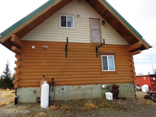 31580 Hannah Rene Rd, Anchor Point, AK 99556 - view of property exterior featuring log siding