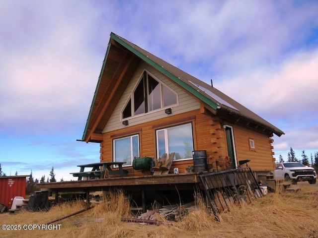 31580 Hannah Rene Rd, Anchor Point, AK 99556 - back of house featuring log exterior and a wooden deck