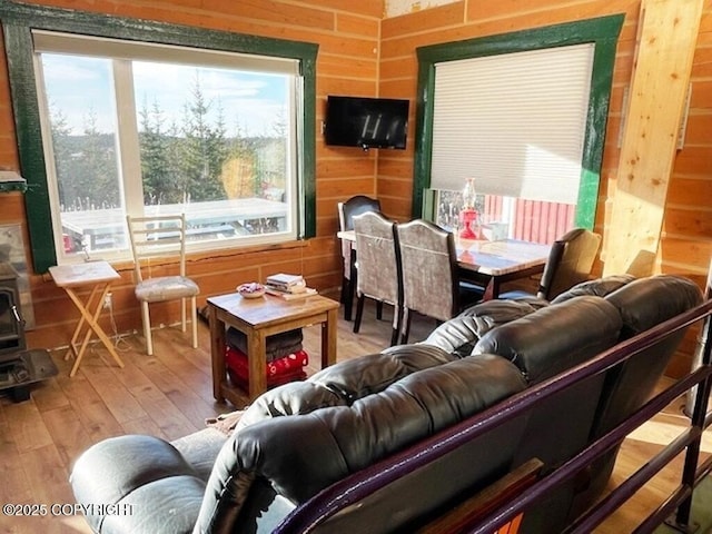 31580 Hannah Rene Rd, Anchor Point, AK 99556 - dining room with wood-type flooring and wood walls