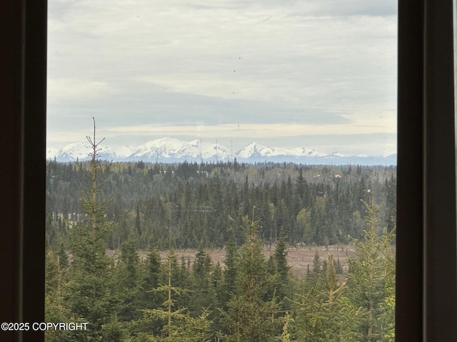 31580 Hannah Rene Rd, Anchor Point, AK 99556 - view of mountain backdrop with a heavily wooded area