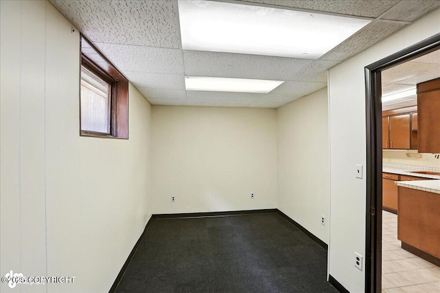 933 W 20th Ave, Anchorage, AK 99503 - spare room featuring a paneled ceiling and a sink