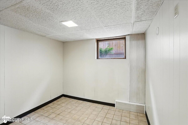 933 W 20th Ave, Anchorage, AK 99503 - basement featuring a drop ceiling and wooden walls