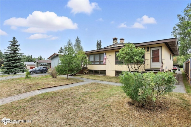 933 W 20th Ave, Anchorage, AK 99503 - view of front of home with a front yard