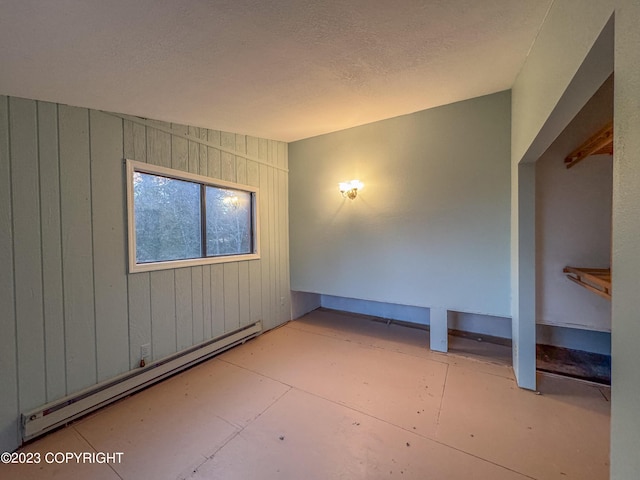 view of patio / terrace featuring baseboard heating