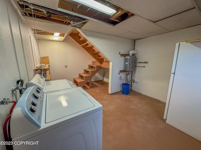 clothes washing area featuring washing machine and clothes dryer