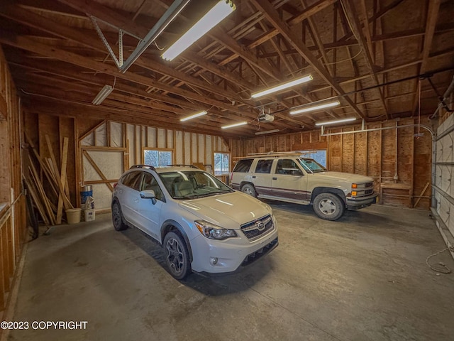 garage featuring a garage door opener