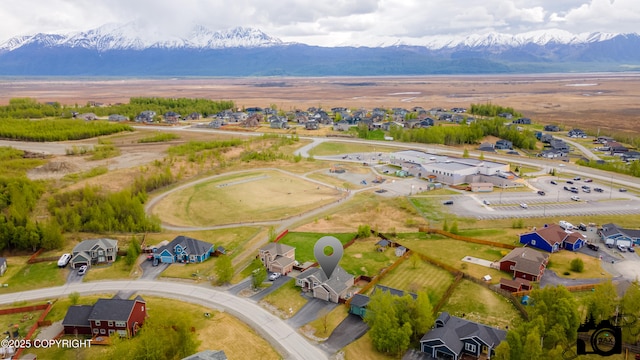 5010 E Fetlock Dr, Wasilla, AK 99654 - aerial view of residential area with a mountain backdrop