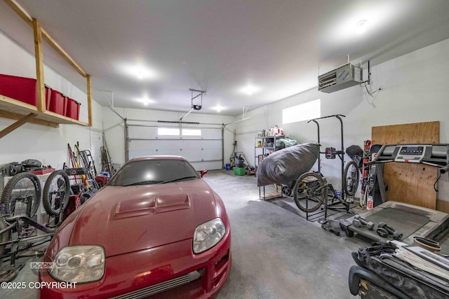 3589 N Magnolia Cir, Wasilla, AK 99654 - garage featuring a garage door opener