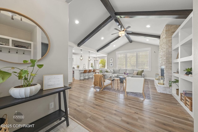 3589 N Magnolia Cir, Wasilla, AK 99654 - living room with ceiling fan, light wood-style floors, recessed lighting, built in features, and baseboards