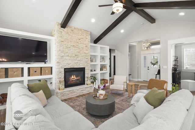 3589 N Magnolia Cir, Wasilla, AK 99654 - living area with wood finished floors, a fireplace, ceiling fan, a chandelier, and recessed lighting