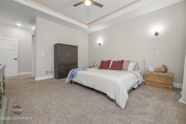 3589 N Magnolia Cir, Wasilla, AK 99654 - carpeted bedroom with ornamental molding, baseboards, a ceiling fan, and a tray ceiling
