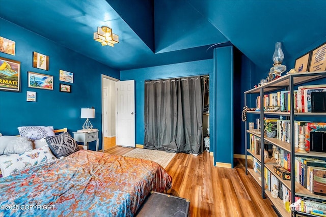 6010 Staedem Dr, Anchorage, AK 99504 - bedroom featuring wood finished floors and baseboards