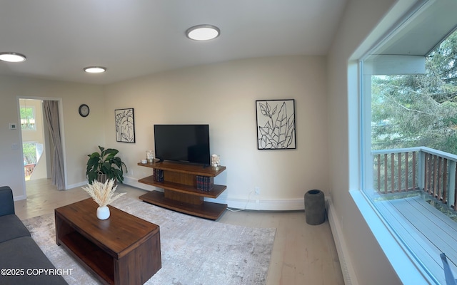 741 W 20th Ave, Anchorage, AK 99503 - living area featuring baseboards and wood finished floors