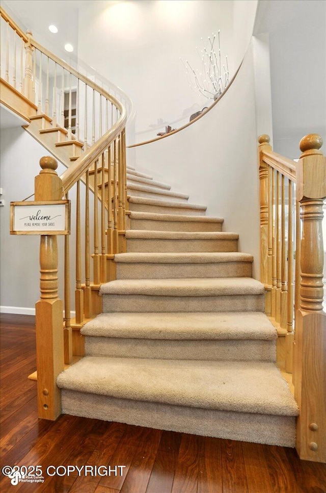 3833 Eastwind Dr, Anchorage, AK 99516 - staircase featuring wood finished floors, baseboards, and recessed lighting
